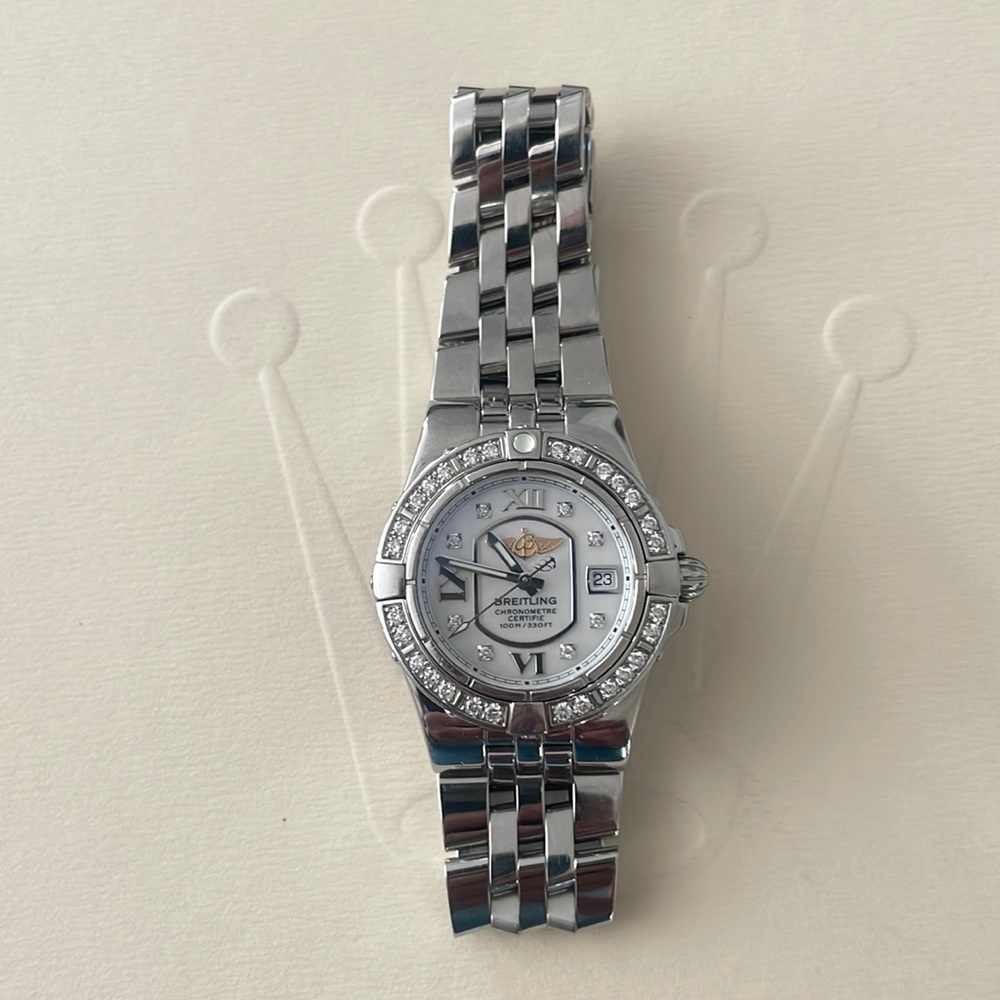 Ladies Breitling, all factory diamonds